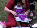 [Bailey with a purple bathing suit]