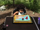 [Bailey blowing out a candle]